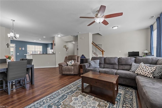 264 Feldspar St, Virginia Beach, VA 23462 - living area featuring dark wood-style flooring, a ceiling fan, a chandelier, stairway, and baseboards