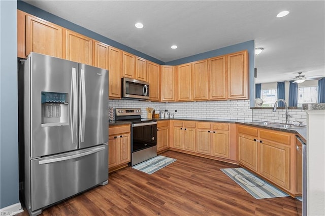 264 Feldspar St, Virginia Beach, VA 23462 - kitchen featuring stainless steel appliances, a sink, backsplash, dark wood finished floors, and recessed lighting