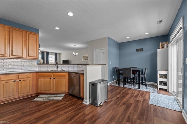 264 Feldspar St, Virginia Beach, VA 23462 - kitchen featuring dishwasher, a sink, dark wood-type flooring, a peninsula, and a chandelier