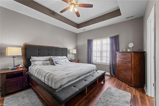264 Feldspar St, Virginia Beach, VA 23462 - bedroom with a tray ceiling, baseboards, wood finished floors, and a ceiling fan