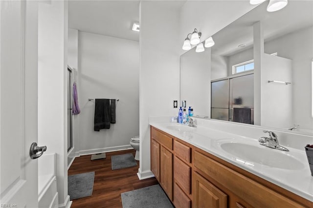 264 Feldspar St, Virginia Beach, VA 23462 - full bathroom with toilet, double vanity, a shower stall, and wood finished floors