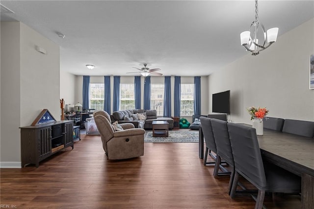 264 Feldspar St, Virginia Beach, VA 23462 - living room featuring healthy amount of natural light, dark wood-type flooring, a chandelier, and ceiling fan