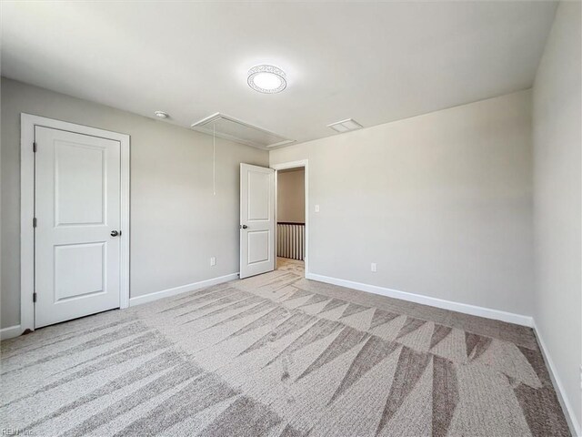 206 Loon Ct, Newport News, VA 23606 - unfurnished bedroom with attic access, baseboards, and light colored carpet