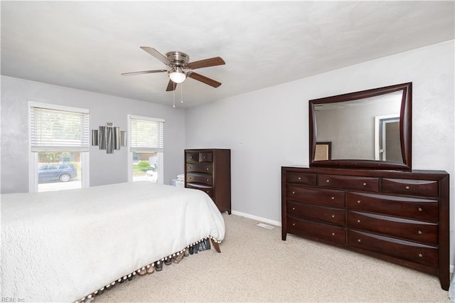 2668 N Elizabeth Harbor Dr, Chesapeake, VA 23321 - bedroom featuring light carpet, a ceiling fan, and baseboards