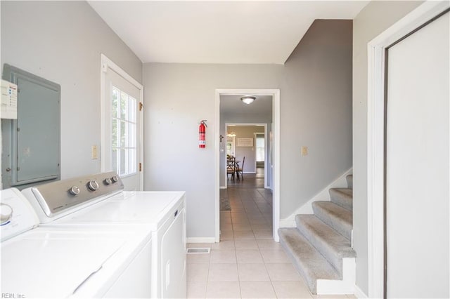2668 N Elizabeth Harbor Dr, Chesapeake, VA 23321 - washroom with washer and dryer, electric panel, light tile patterned floors, and baseboards