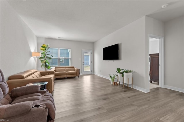 23050 Preserve Pl, Carrollton, VA 23314 - living room with wood finished floors and baseboards