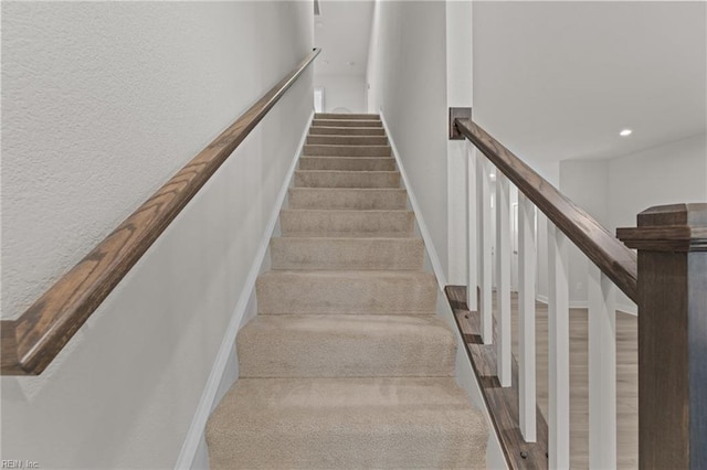 23050 Preserve Pl, Carrollton, VA 23314 - staircase featuring recessed lighting