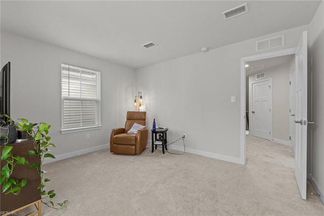 23050 Preserve Pl, Carrollton, VA 23314 - sitting room with light colored carpet, baseboards, and attic access