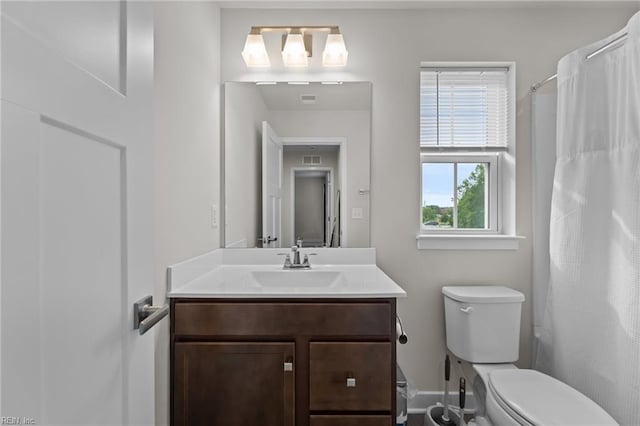 23050 Preserve Pl, Carrollton, VA 23314 - full bathroom with toilet, vanity, a shower with curtain, and baseboards