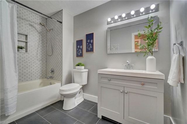529 Warren Ave, Chesapeake, VA 23322 - bathroom featuring shower / bath combo with shower curtain, vanity, tile patterned floors, toilet, and baseboards