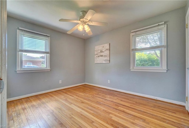 529 Warren Ave, Chesapeake, VA 23322 - empty room with plenty of natural light, light wood-style floors, baseboards, and a ceiling fan