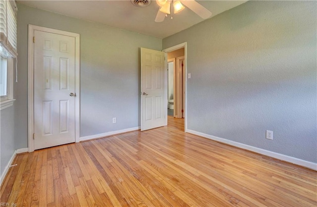 529 Warren Ave, Chesapeake, VA 23322 - unfurnished bedroom with light wood-style floors, baseboards, and ceiling fan