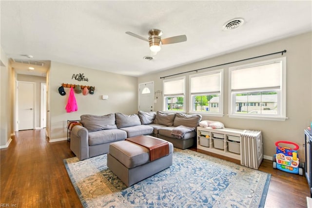 7413 Doummar Dr, Norfolk, VA 23518 - living room with wood finished floors, baseboards, and a ceiling fan