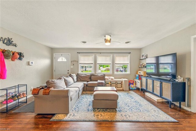 7413 Doummar Dr, Norfolk, VA 23518 - living area featuring wood finished floors, a ceiling fan, and baseboards