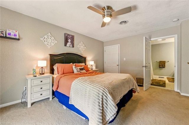 7413 Doummar Dr, Norfolk, VA 23518 - bedroom featuring light colored carpet, baseboards, a ceiling fan, and ensuite bathroom