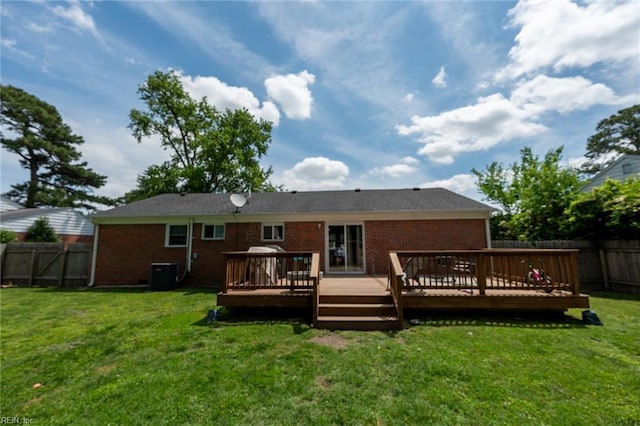 7413 Doummar Dr, Norfolk, VA 23518 - back of house featuring brick siding, a wooden deck, and central AC