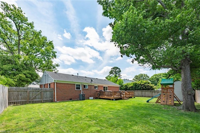 7413 Doummar Dr, Norfolk, VA 23518 - view of yard featuring a deck, a playground, and central AC