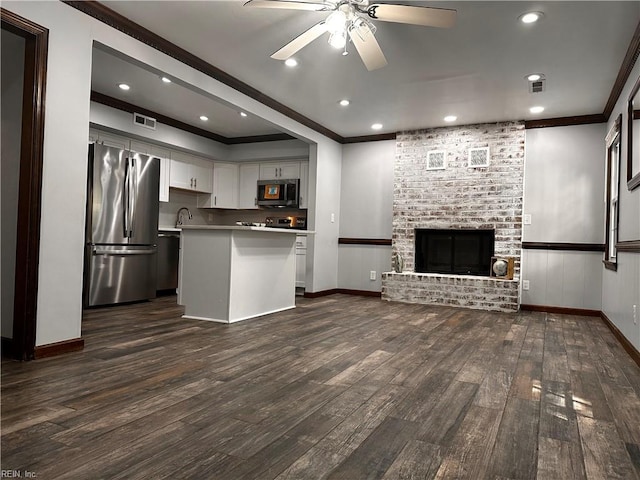1013 River Birch Ct, Chesapeake, VA 23320 - kitchen with freestanding refrigerator, crown molding, open floor plan, a ceiling fan, and dark wood-style floors
