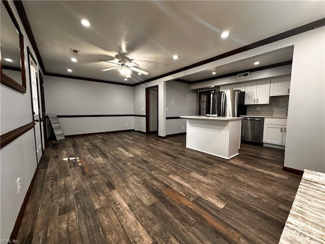 1013 River Birch Ct, Chesapeake, VA 23320 - kitchen featuring appliances with stainless steel finishes, ceiling fan, white cabinetry, light countertops, and crown molding