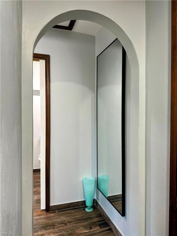 1013 River Birch Ct, Chesapeake, VA 23320 - hallway featuring dark wood-type flooring and arched walkways