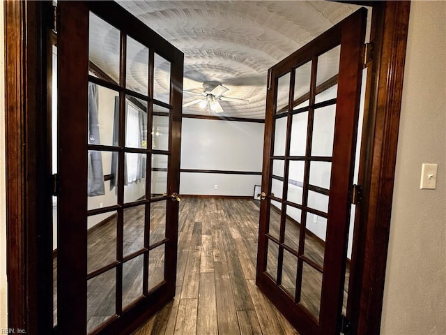 1013 River Birch Ct, Chesapeake, VA 23320 - hall with french doors, dark wood-type flooring, baseboards, and crown molding