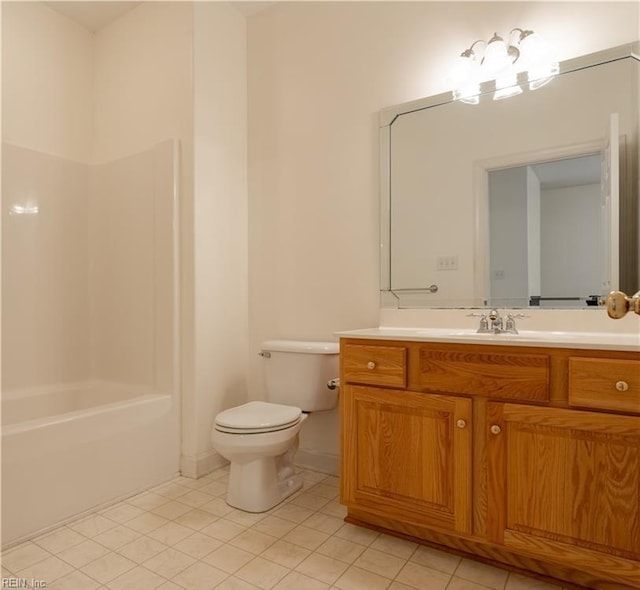 3711 Goodwin Neck Rd, Yorktown, VA 23692 - full bathroom with tile patterned floors, vanity, toilet, and  shower combination