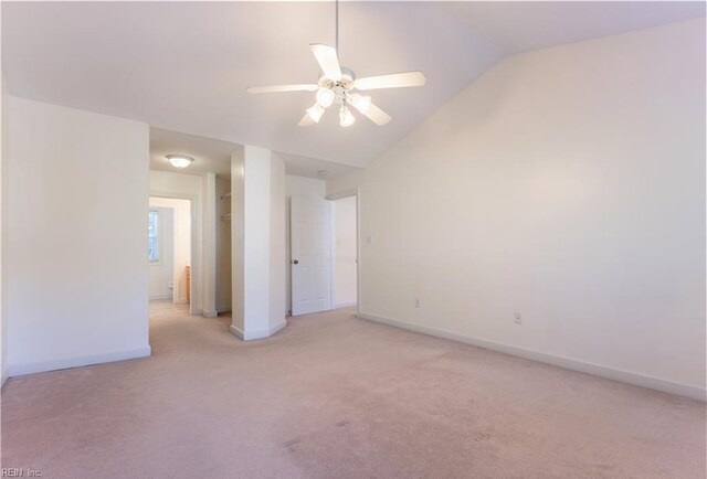 3711 Goodwin Neck Rd, Yorktown, VA 23692 - unfurnished bedroom with light carpet, vaulted ceiling, baseboards, and ceiling fan
