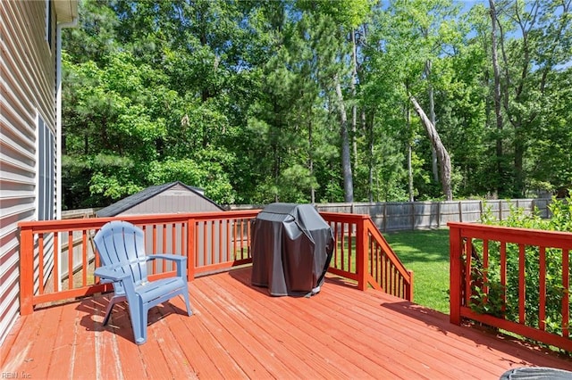 3711 Goodwin Neck Rd, Yorktown, VA 23692 - wooden terrace with view of wooded area and a grill
