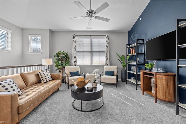 1501 Kathy Ann Way E, Carrollton, VA 23314 - living area with carpet flooring and a ceiling fan