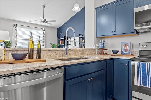 1501 Kathy Ann Way E, Carrollton, VA 23314 - kitchen with stainless steel appliances, blue cabinets, a sink, a ceiling fan, and light stone counters