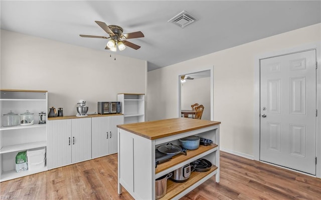 3213 Ashaway Rd, Virginia Beach, VA 23452 - kitchen featuring open shelves, a ceiling fan, wood counters, wood finished floors, and white cabinets