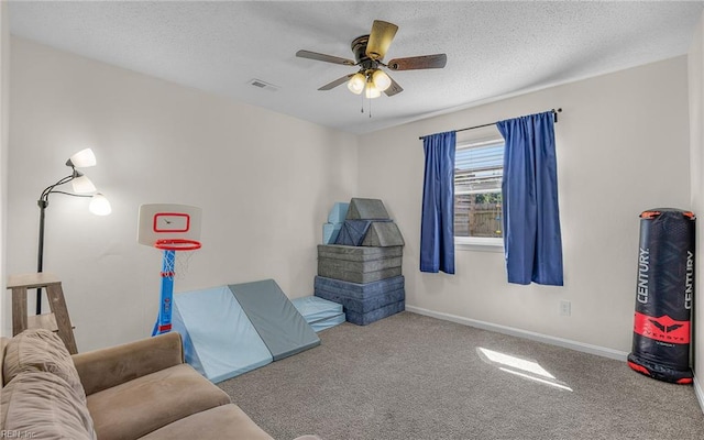 3213 Ashaway Rd, Virginia Beach, VA 23452 - living area featuring a ceiling fan, carpet floors, baseboards, and a textured ceiling
