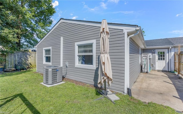 3213 Ashaway Rd, Virginia Beach, VA 23452 - view of side of property with central air condition unit and a patio