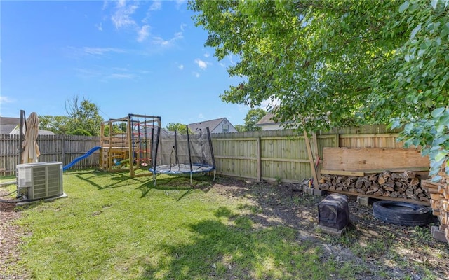 3213 Ashaway Rd, Virginia Beach, VA 23452 - view of yard with central AC unit, a playground, and a trampoline