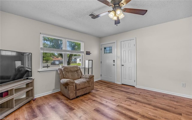 3213 Ashaway Rd, Virginia Beach, VA 23452 - sitting room featuring wood finished floors, ceiling fan, a textured ceiling, and baseboards