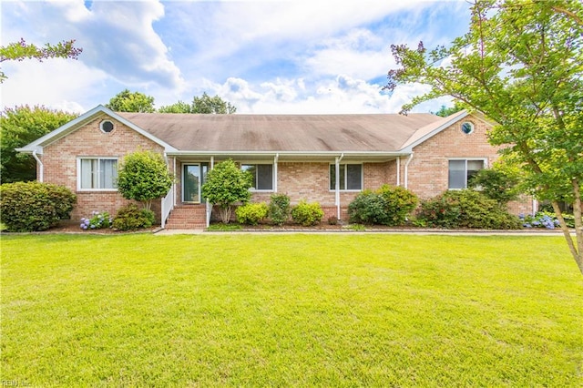 1364 Sir Richard Rd, Virginia Beach, VA 23455 - ranch-style home with brick siding, a front yard, and roof with shingles