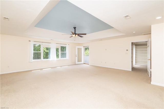 1364 Sir Richard Rd, Virginia Beach, VA 23455 - empty room featuring a tray ceiling, light carpet, baseboards, ceiling fan, and recessed lighting