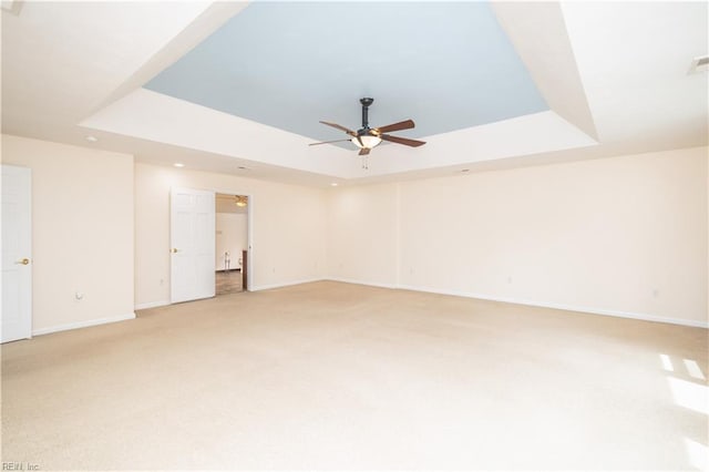 1364 Sir Richard Rd, Virginia Beach, VA 23455 - spare room with a raised ceiling, ceiling fan, light colored carpet, baseboards, and recessed lighting