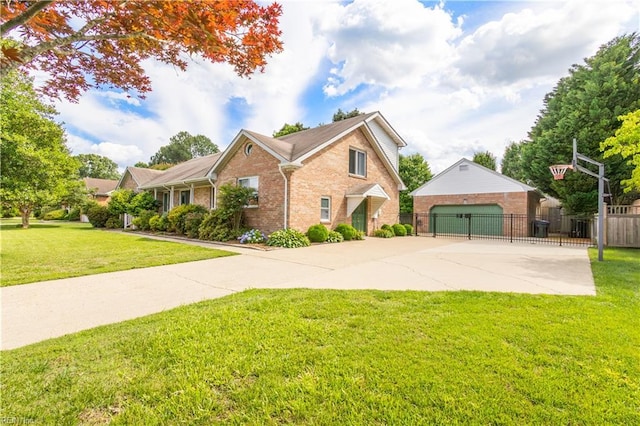 1364 Sir Richard Rd, Virginia Beach, VA 23455 - view of front of home with brick siding, a detached garage, and a gate