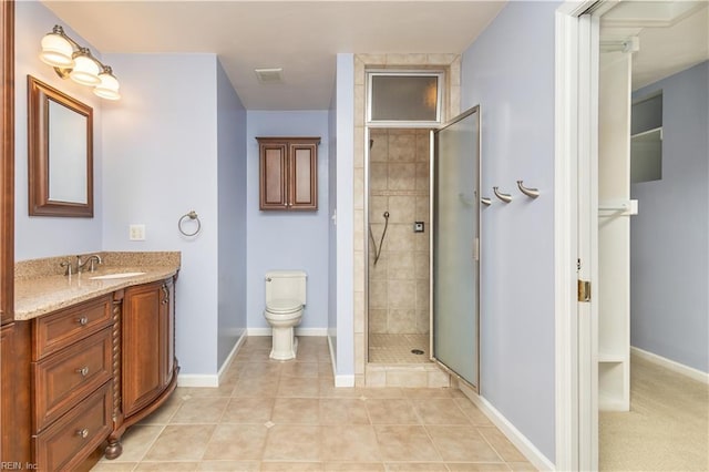 1364 Sir Richard Rd, Virginia Beach, VA 23455 - full bathroom with vanity, a shower stall, baseboards, tile patterned floors, and toilet