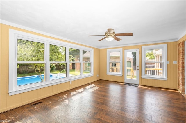 1364 Sir Richard Rd, Virginia Beach, VA 23455 - empty room with plenty of natural light, a ceiling fan, wood finished floors, and crown molding
