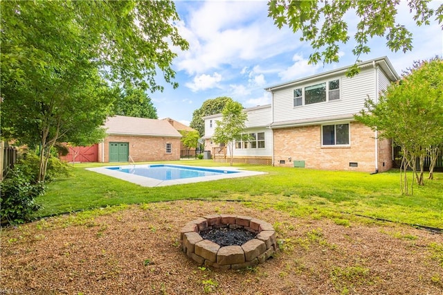 1364 Sir Richard Rd, Virginia Beach, VA 23455 - rear view of house with crawl space, brick siding, and a fire pit