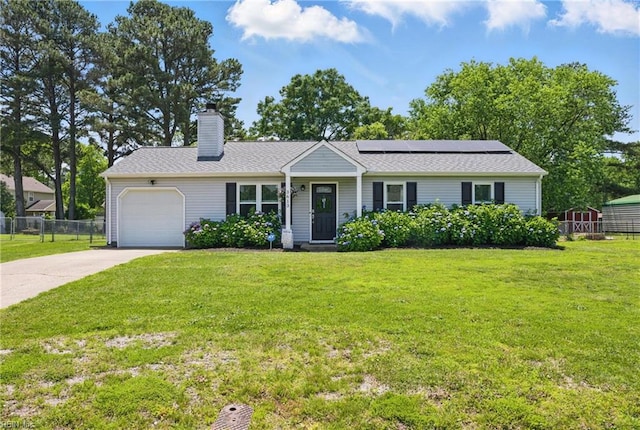 3613 Mostiler Pl, Chesapeake, VA 23323 - ranch-style house featuring a garage, roof mounted solar panels, a chimney, driveway, and a shingled roof
