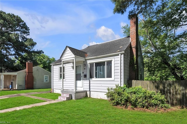 1424 Stewart St, Chesapeake, VA 23324 - bungalow-style house with a chimney and roof with shingles