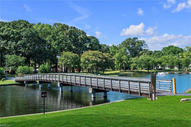 1424 Stewart St, Chesapeake, VA 23324 - dock featuring a yard, a water view, and view of scattered trees