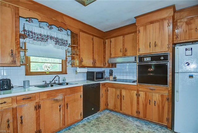 409 Briarfield Dr, Chesapeake, VA 23322 - kitchen featuring black appliances, a sink, ventilation hood, backsplash, and brown cabinetry