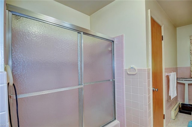 409 Briarfield Dr, Chesapeake, VA 23322 - bathroom with a stall shower, a baseboard heating unit, tile walls, and a wainscoted wall