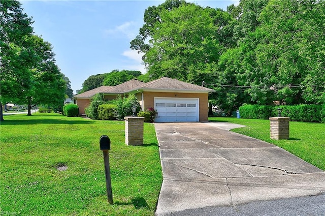 409 Briarfield Dr, Chesapeake, VA 23322 - view of front facade featuring a garage, a front yard, driveway, and stucco siding