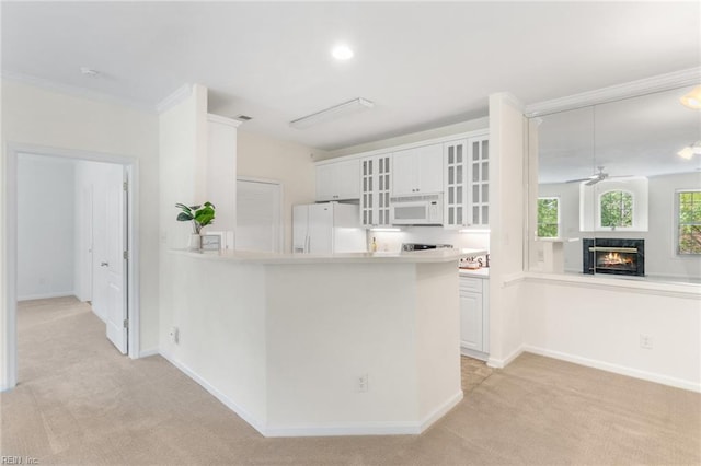 2819 Rose Garden Way, Virginia Beach, VA 23456 - kitchen featuring white appliances, light colored carpet, a high end fireplace, white cabinetry, and glass insert cabinets