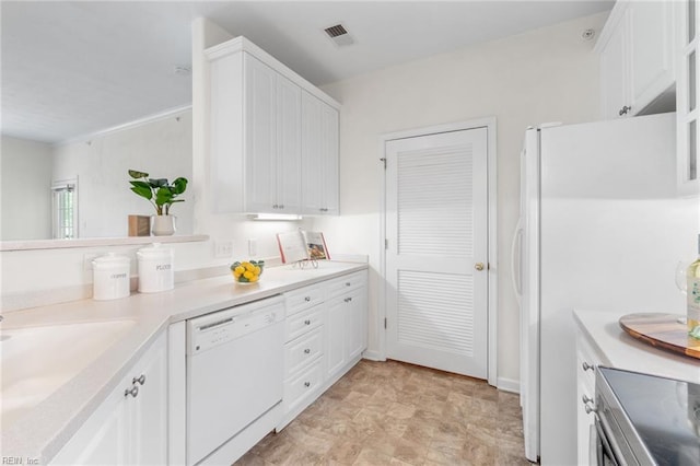 2819 Rose Garden Way, Virginia Beach, VA 23456 - kitchen featuring white appliances, white cabinetry, and light countertops